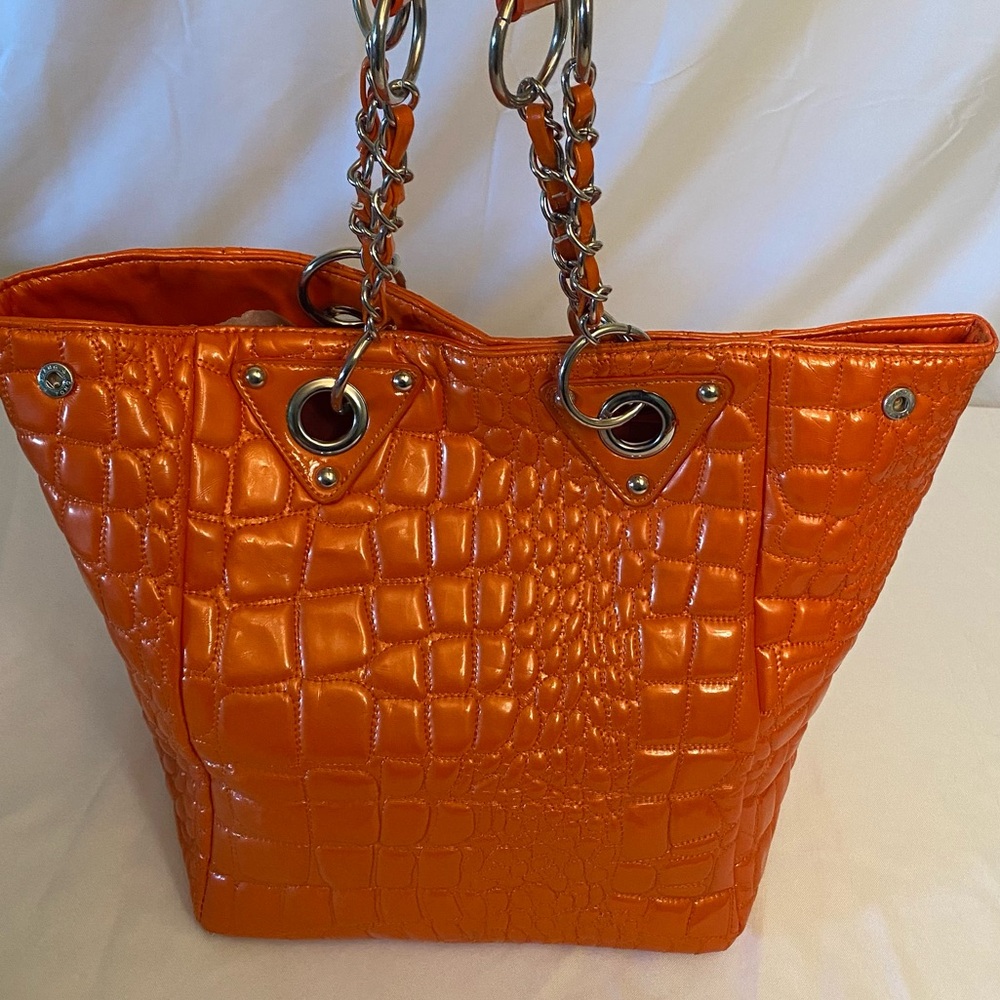 Kristine shoulder strap, orange large tote bag with silver metal accents